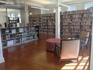 Stacks in the upstairs of the Library Adult Services